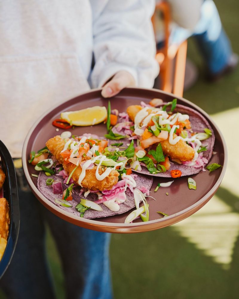 Fish tacos being served