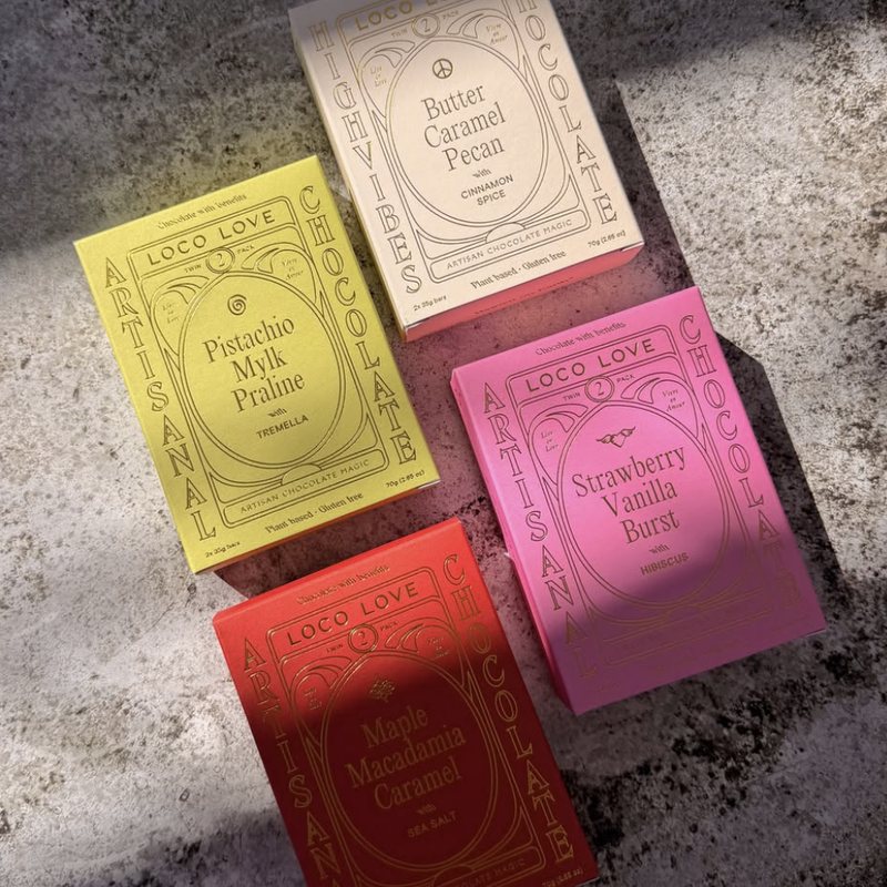 Loco Love artisanal chocolate boxes in pistachio, butter caramel pecan, strawberry vanilla and maple macadamia